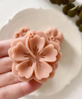 White Cherry Blossom Mooncake Mold With 30g Hand Press Cookie Stamp, six petal floral design in hand, ideal for baking.