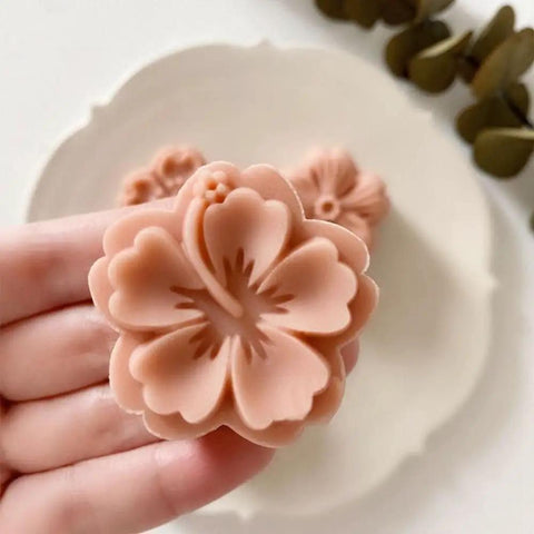 White Cherry Blossom Mooncake Mold With 30g Hand Press Cookie Stamp, six petal floral design in hand, ideal for baking.