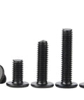 Rock Solid M2.5 X 6mm Cross Recess Wafer Head Machine Screws With A Slick Black Plated Finish, assorted sizes in a row.