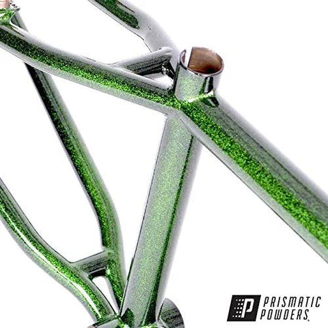 Front view of a bicycle frame powder-coated in green glitter by Prismatic Powders.