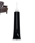Leather Repair Cream For Furniture, Cars, Bags And Boots - Quick-Dry Liquid Pigment, 20ml tube next to a leather chair.