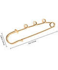 Must Have Set Of Twenty Super Tough Golden Loop Safety Pins To Quick Fix Denim And Anchor Heavy Skirts While Halting Embarrassing Wardrobe Malfunctions Daily, 2-inch gold safety pin showing measurement.