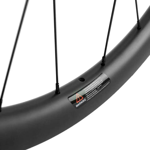 Close-up of 38mm Carbon Tubeless Disc Road Wheelset 700C With Center Lock Front 12x100mm Rear 12x142mm, 31mm Wide Rim Tubeless Ready