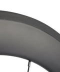 Close-up of Road Ready Turbo Carbon Wheelset 38 50 60 88mm for 700c clincher, 23mm wide UD matte finish, aero rim edge detail.