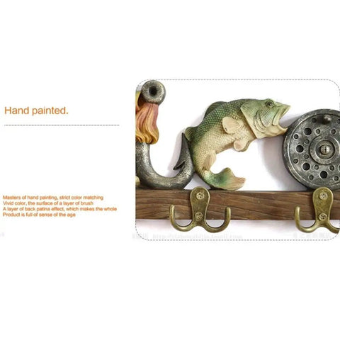 Top Tier Wall Mounted Coat Rack Featuring Durable Brass Hooks And Streamlined Nordic Shape For Your Busy Hallway with fish design.
