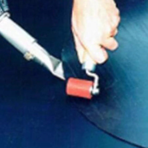 Silicone seam roller with red 40mm wheel and white handle for roofing tape installation