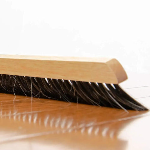 Top Shelf Replacement Broom Head For BR314 Flex Handle featuring sturdy pet and horse hair bristles on hardwood floor.