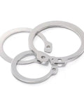 Top Shelf Heavy Duty Stainless Steel Circlip Pliers And Snap Ring Tool Kit with three stainless steel retaining rings.