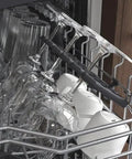 Swedish Engineered Integrated Dishwasher 60 Cm Wide Silent Heavy Duty Kitchen Workhorse with clean glassware and dishes.