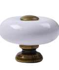 Slick Round Ceramic Cabinet Knobs With Antique Brass Base, Old School Drawer Pulls For Dressers And Closets, Chip Resistant White Glaze close-up.