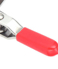 Rock Solid Toggle Clamp Featuring Tough As Nails 133 Pound Holding Capacity And Ergonomic Handle close-up of red plastic handle and steel pivot.