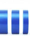Four blue rolls of CNC Vacuum Chuck Tape Roll Pro Grade 25m Long 0.2mm Thick Reinforced PET Adhesive Film for machining and workholding.