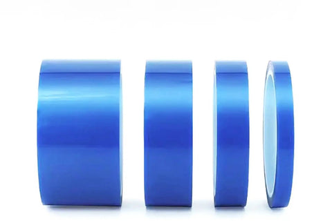 Four blue rolls of CNC Vacuum Chuck Tape Roll Pro Grade 25m Long 0.2mm Thick Reinforced PET Adhesive Film for machining and workholding.