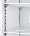 Rock Solid Commercial Freezer 31 Inch Reach In Upright Design With Solid Door, Four Adjustable Shelves, 18 Cubic Feet Manual Defrost, NSF Certified White Unit showing adjustable shelves.