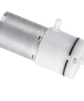 Micro air pump, DC 12V, metal motor with white plastic housing, side view.