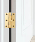 Solid Brass Hinges Set For Cabinets And Jewelry Boxes 1/2 Inch, 2 Inch, And 2.5 Inch Butt Hinges installed on white door