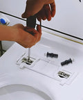 Person using a screwdriver to install Solid Brass Core Expanding Rubber Screw Bolts For Universal Top Mount Toilet Seats Blind Hole Quick Replacement Hardware Kit Four Piece Set.