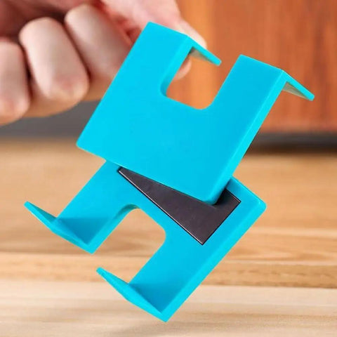 Close-up of blue Magnetic Hinge Jig for drill-free installation with 2mm alignment groove for cabinets and drawers woodworking projects.