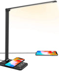 Boss Desk Lamp With Wireless Charging 10W And USB Port Dimmable Eye Caring Light illuminated, showing touch controls and charging phone.