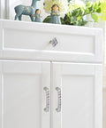 U Shape Crystal Glass Diamond Rhinestone Cabinet Pulls 4 Pack With 2.5 Inch Center Holes Installed on White Cupboard Doors