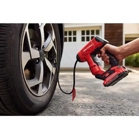 Person using V20 Cordless Tire Inflator And Portable Air Compressor With Digital Pressure Gauge Up To 150 Psi Quick On The Go Inflate for car tire.