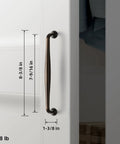 Oil Rubbed Bronze Cabinet Pulls 7 9 16 Inch Centers Six Pack Sleek Transitional Spindle Handles installed on white cabinet
