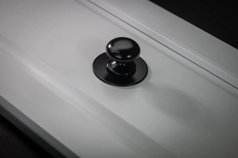 Matte Black Large Bifold Closet Door Knobs Four Pack With Renovation Ready Wide Base Zinc Round Kitchen Wardrobe Dresser Dummy Pull Knobs One And A Half Inch Furniture Sideboard Drawer Handles installed on door