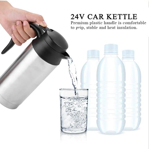 Boss Level 24v Electric Water Kettle For Truckers And Road Warriors 750ml pouring hot water into a glass with water bottles in background.