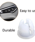 Beefy 10 Pack Car Headlamp Mounting Grommet Retaining Clip Set For Secure Headlight Install closeup with headlight assembly