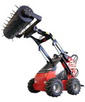 Stomp Mini Skid Steer Loader With 1800 Lb Capacity And Lawn Scarifier Attachment For Small Jobs, raised view