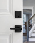 Matte Black Keyed Entry Lever And Deadbolt Combo With SmartKey For Easy Lockup, Smooth Lever Action, Anti Sag Design, Rekeyable Security, Ideal Front Door Upgrade installed on white door