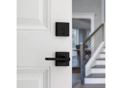 Matte Black Keyed Entry Lever And Deadbolt Combo With SmartKey For Easy Lockup, Smooth Lever Action, Anti Sag Design, Rekeyable Security, Ideal Front Door Upgrade installed on white door