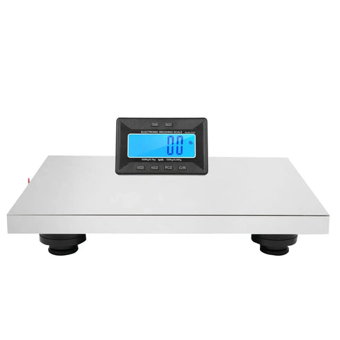 Commercial Grade Digital Shipping Scale With Wireless Display And Bullyproof Stainless Steel Platform 992 Lb Heavy Duty Postal Scale on flat surface.