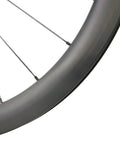 Close-up of Beefy Carbon Wheelset 700C Disc Brakes 45mm Tubeless Ready Clincher for Road Bikes Lightweight Toray T700 Rim