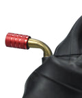 Close-up of valve and inner tube from 9x3.50-4 Tire With Inner Tube Replacement For 49cc Stand Up Gas Scooter 4-Wheeler Garden Tractor Go Kart Lawn Mower