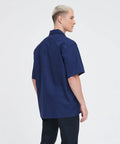 Men's Short Sleeve Work Shirt In Navy Blue Cotton Poly Blend Durable Button Front Uniform Features Double Chest Pockets Built Hella Tough For The Daily Grind And Extra Large Cut, back view.