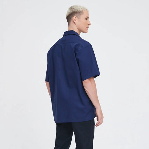 Men's Short Sleeve Work Shirt In Navy Blue Cotton Poly Blend Durable Button Front Uniform Features Double Chest Pockets Built Hella Tough For The Daily Grind And Extra Large Cut, back view.