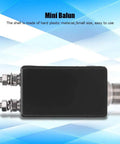 One To One Mini Balun For HF Shortwave Antennas, black compact design, plastic shell with connectors, outdoor QRP station use