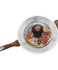 Overhead view of a stovetop with a crisper lid showing a pan converting Turn Any Pan Into A Stove Top Air Fryer With The Crisper Lid.