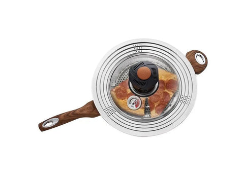 Overhead view of a stovetop with a crisper lid showing a pan converting Turn Any Pan Into A Stove Top Air Fryer With The Crisper Lid.