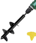 Heavy Duty Garden Auger Drill Bit 4 Inch By 12 Inch Spiral Bulb Planter Tool attached to a drill with yellow markers beside