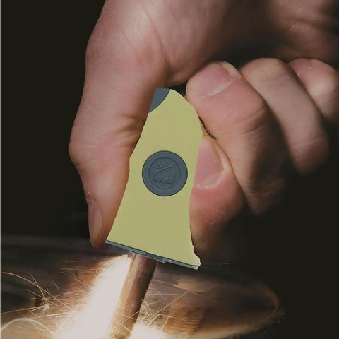 Person using Sparkie Firestarter With Built In Carbide Striker And Spring Loaded Flint Bar For Backpacking Hunting Camping Emergencies