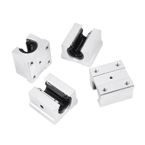 Real Deal SBR12 Linear Rail Shaft Set Built Tough With Four Matching Bushings Featuring Pre Drilled Mounting Holes For CNC Routers 3D Printers And Robotics Projects - close-up of four aluminum bushings.