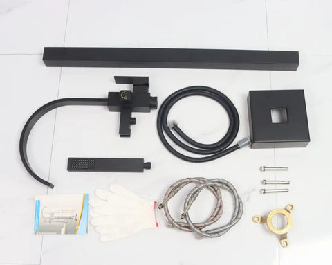 Components of Dope Matte Black Floor Mount Tub Filler With Brass Shower Mixer And Handheld Sprayer 59 Inch Hose displayed on floor