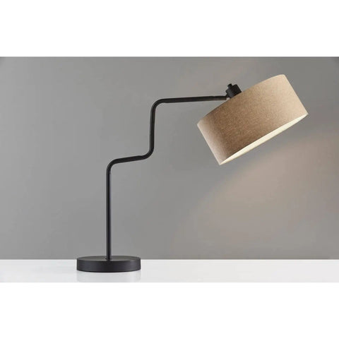 Jacob Table Lamp With Swing Arm, 24 To 25.5 Inch Tall, Antique Bronze Finish, natural woven drum shade, side view lighting