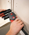User demonstrating No Sweat One Hand Clamp And Spreader For Tough Woodworking 18 Inch Span securing wood pieces.