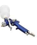Professional HVLP Paint Sprayer with aluminum frame, gravity cup, and adjustable controls for efficient painting.