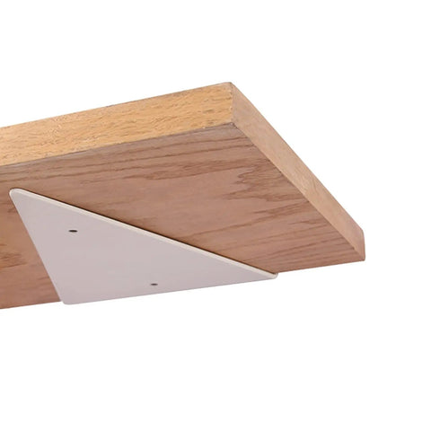 Built Like A Tank Hidden Floating Shelf Brackets 2 Or 4 Pack Incredibly Solid Steel Wall Mount supports an oak wood shelf.