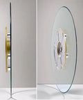 Flawless Finish Tempered Glass Lazy Susan And Smooth Gliding Rotating Serving Tray from side angle showcasing glass and steel base.