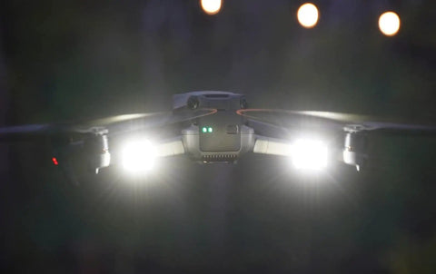 Arc V Pro Grade Multi Color Drone Strobe With Remote Control, 1000 Lumen Output, LEDs lit up on a flying drone at night.